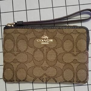 COACH Tan and Brown Signature Wristlet